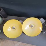 Pair of yellow lacquered metal pendant lights