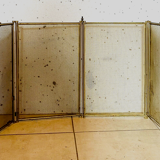 Spark screen has four sheets in brass and braided mesh XX century