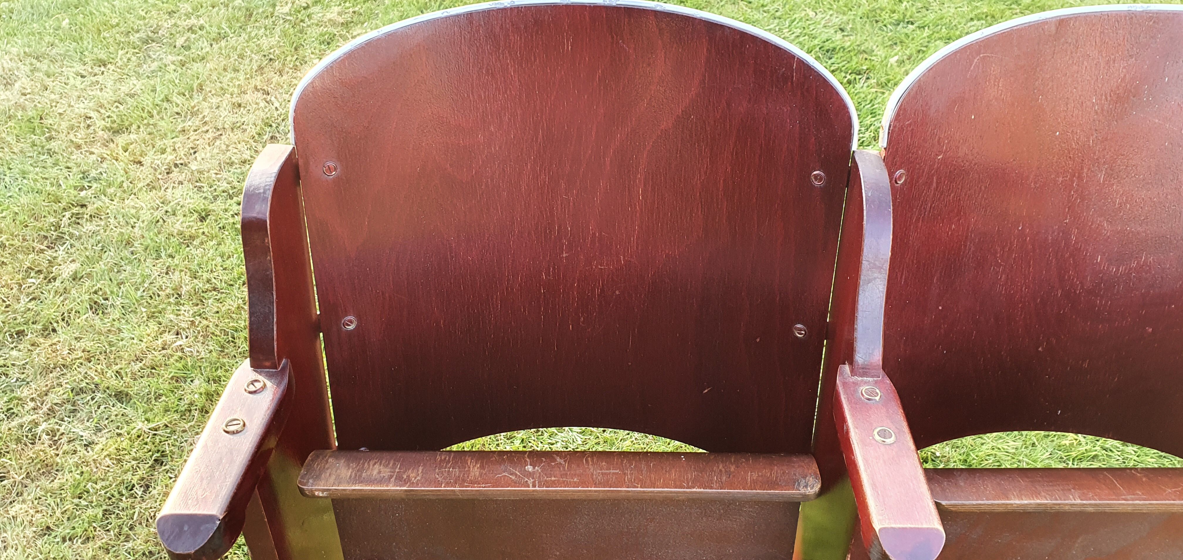 Double curved wooden theatre seats. 1940.