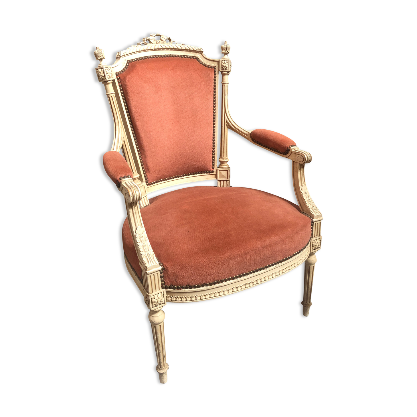 Patinated armchair in Louis XVI style