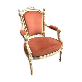 Patinated armchair in Louis XVI style