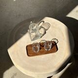 Trio of rounded rectangular trays or cups in monoxyl teak L:35