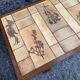 Table basse en bois et céramique herbier