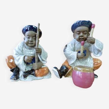 Pair of asian ceramic statues