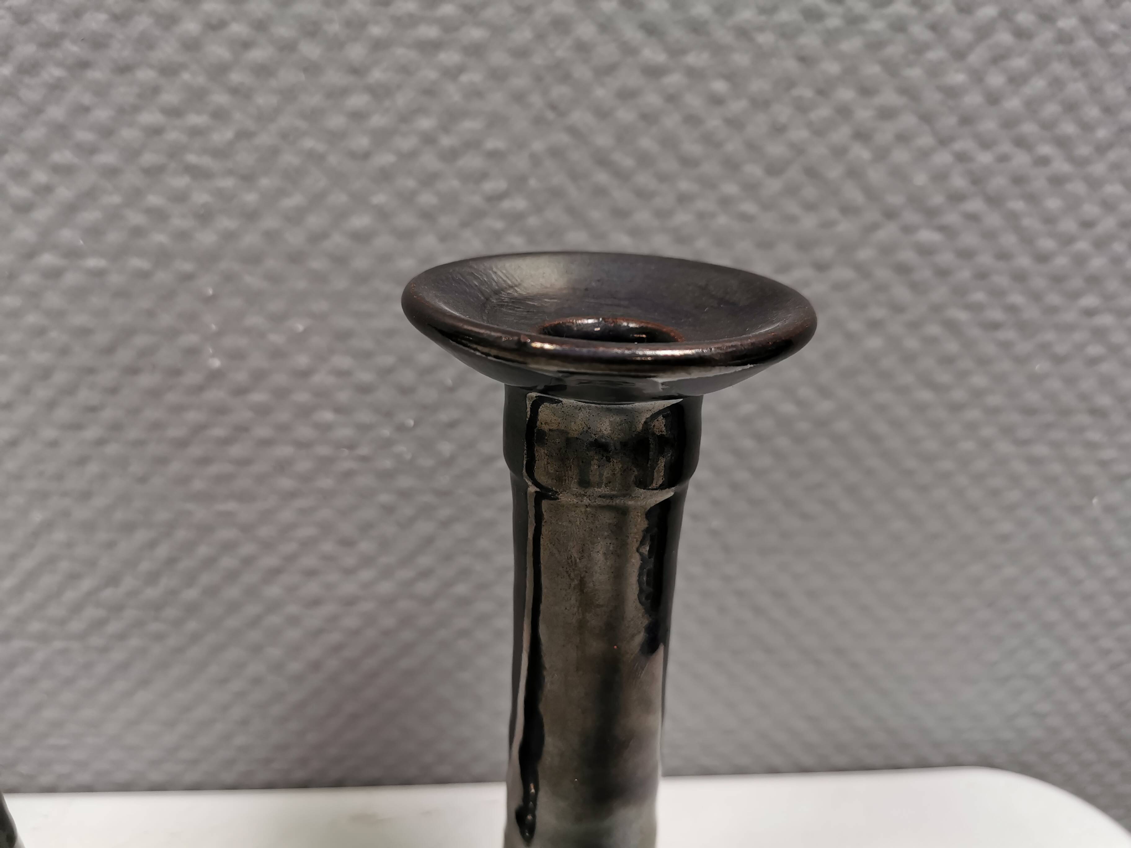 A set of ceramic candlesticks in bluish metallic glaze, Denmark 1980s