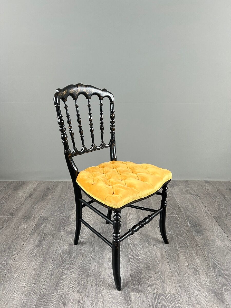 Set of four Napoleon III chairs in blackened wood, 19th century.