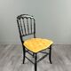 Set of four Napoleon III chairs in blackened wood, 19th century.