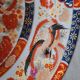 Large deep porcelain plate in Imari style (35.5 cm) with "Phe" decoration.