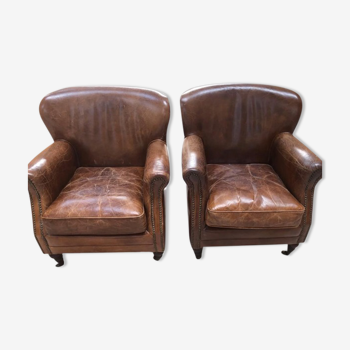 Paire de fauteuils club vintage en cuir