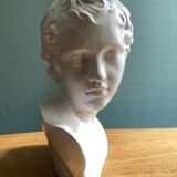 White enamelled terracotta Eros bust