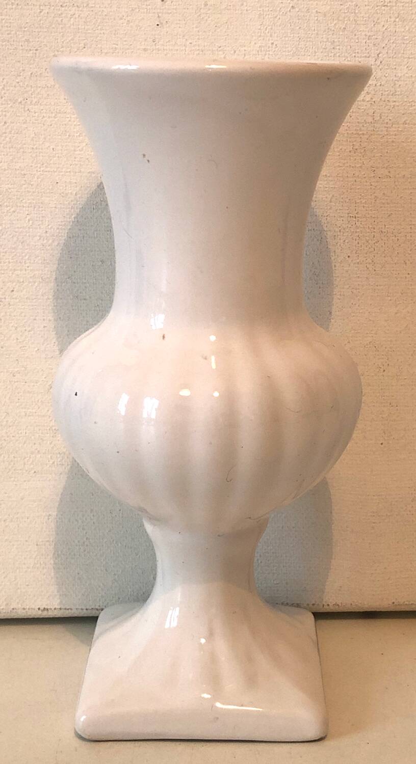 White ceramic medical vase
