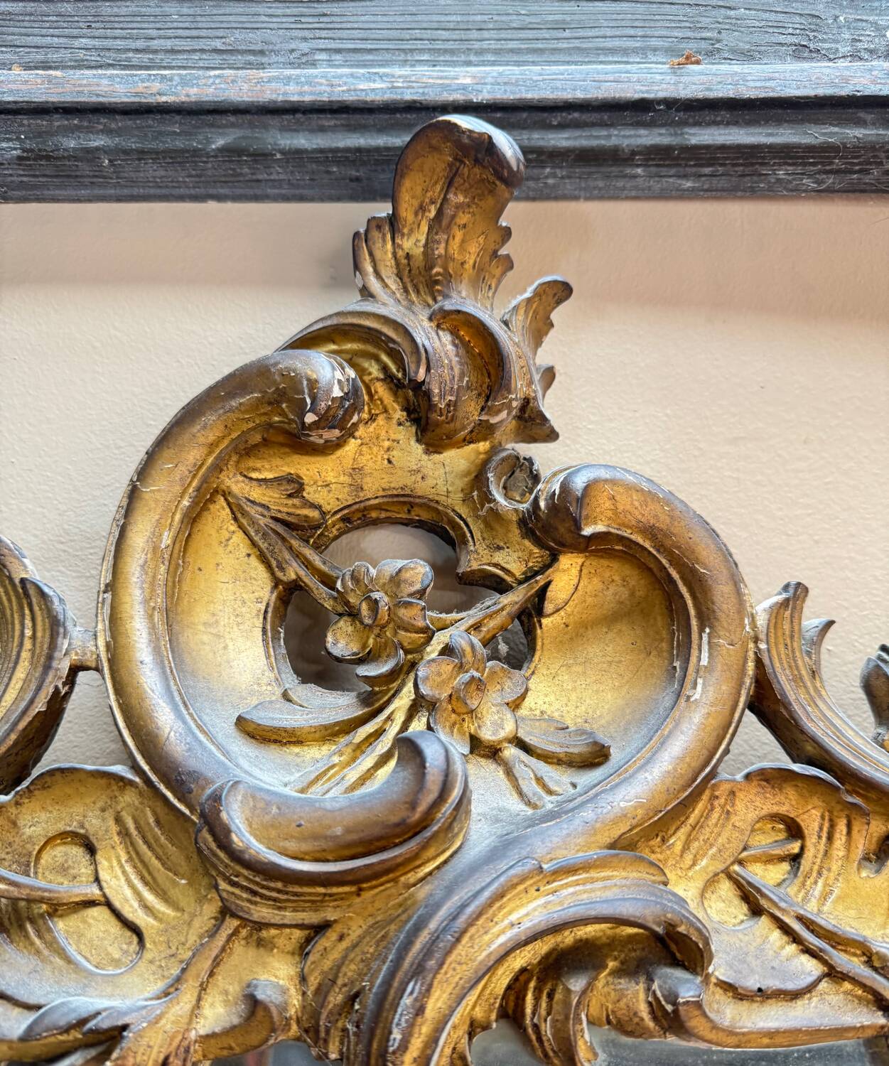 Louis XV period wooden and gilded stucco mirror, 18th century