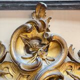 Louis XV period wooden and gilded stucco mirror, 18th century