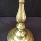 Chiseled gilded metal candlesticks