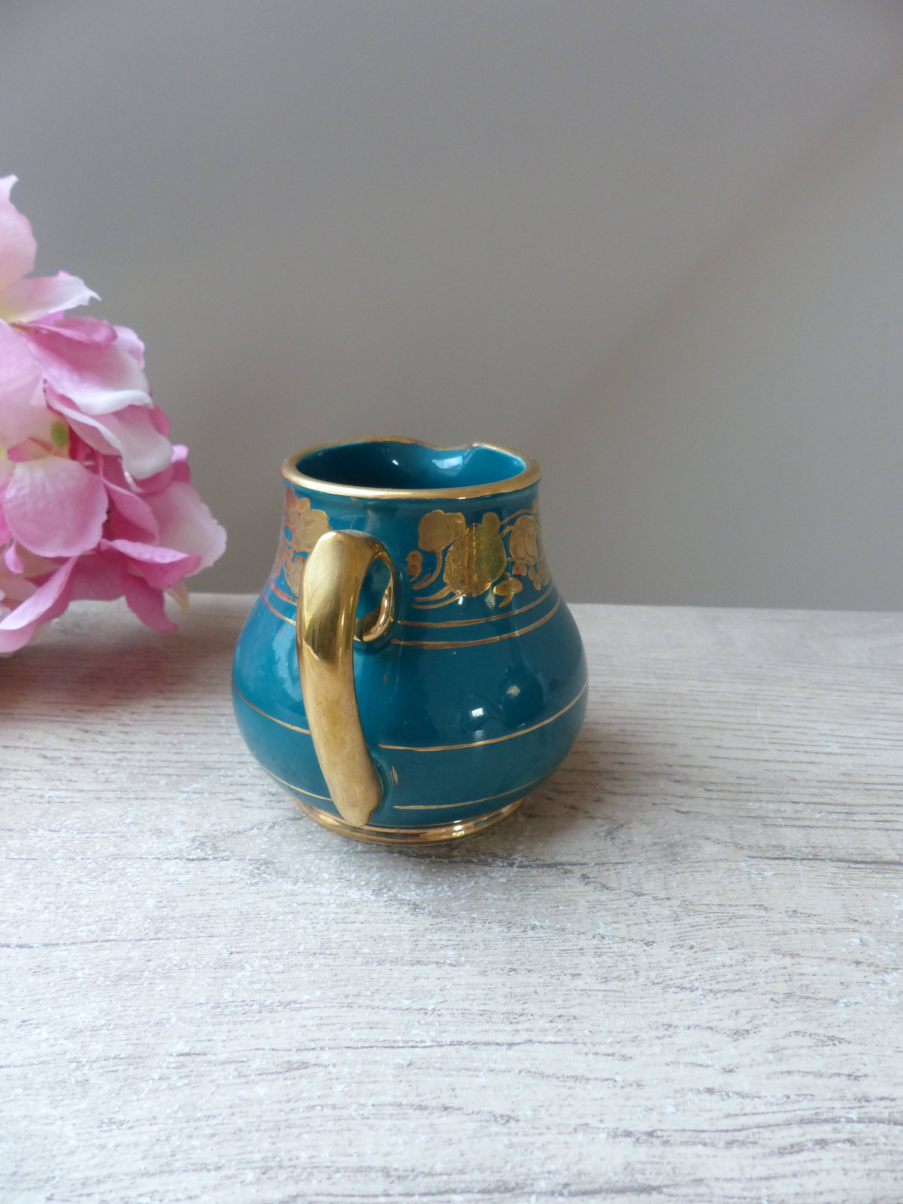 Old small Sadler cream pot in blue green ceramic with gold pattern, English creamer milk pot