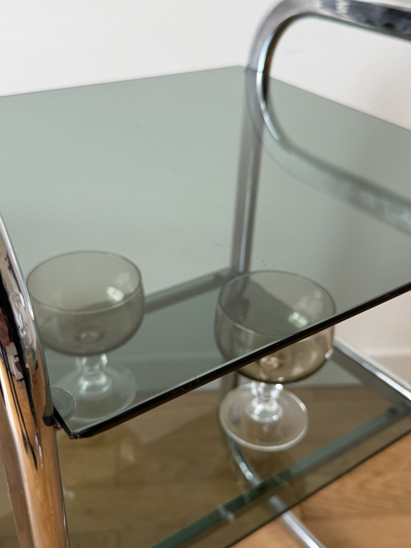 Vintage side table in smoked glass and chrome