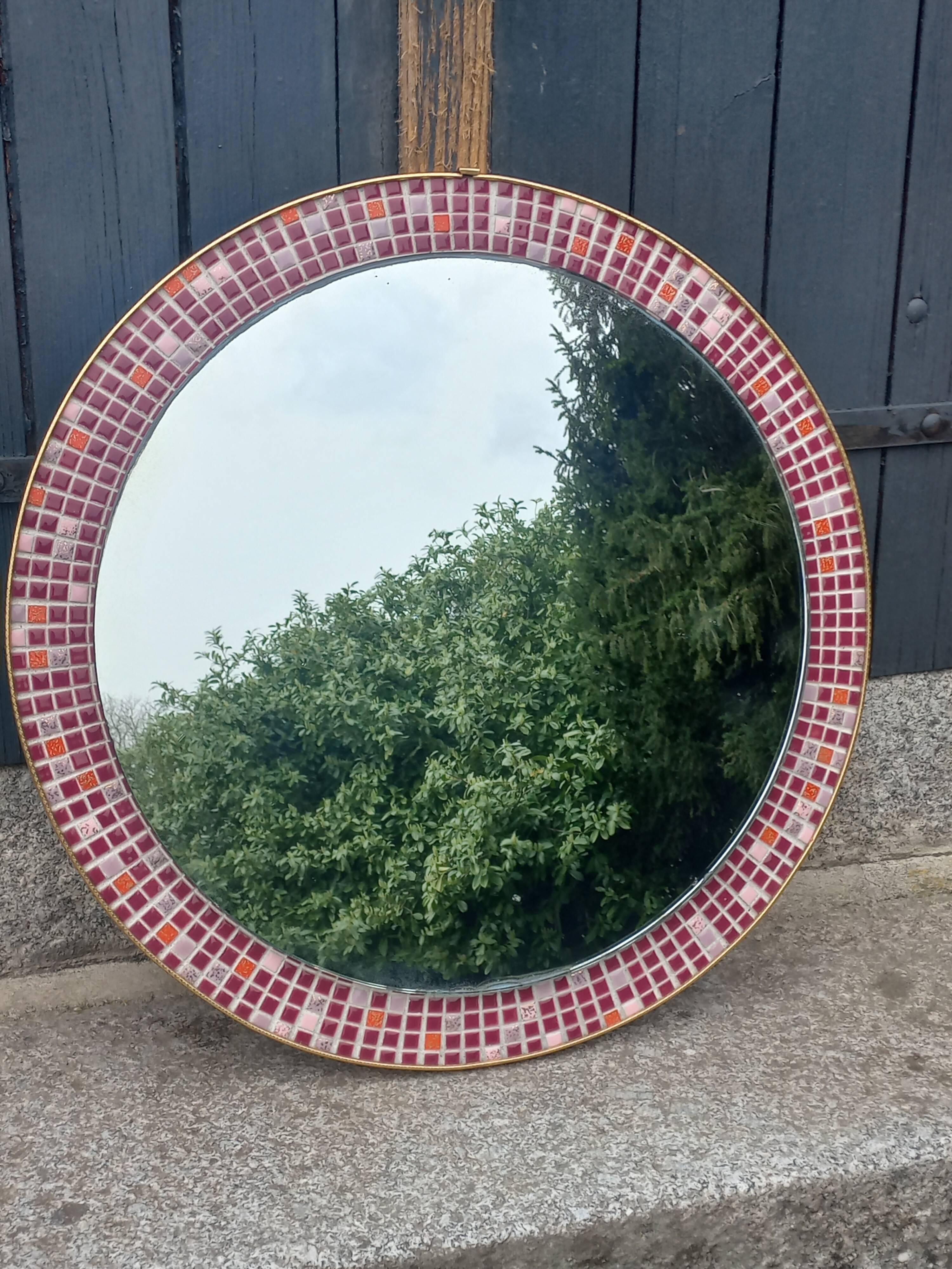 Vintage ceramic mirror from the 1960s.