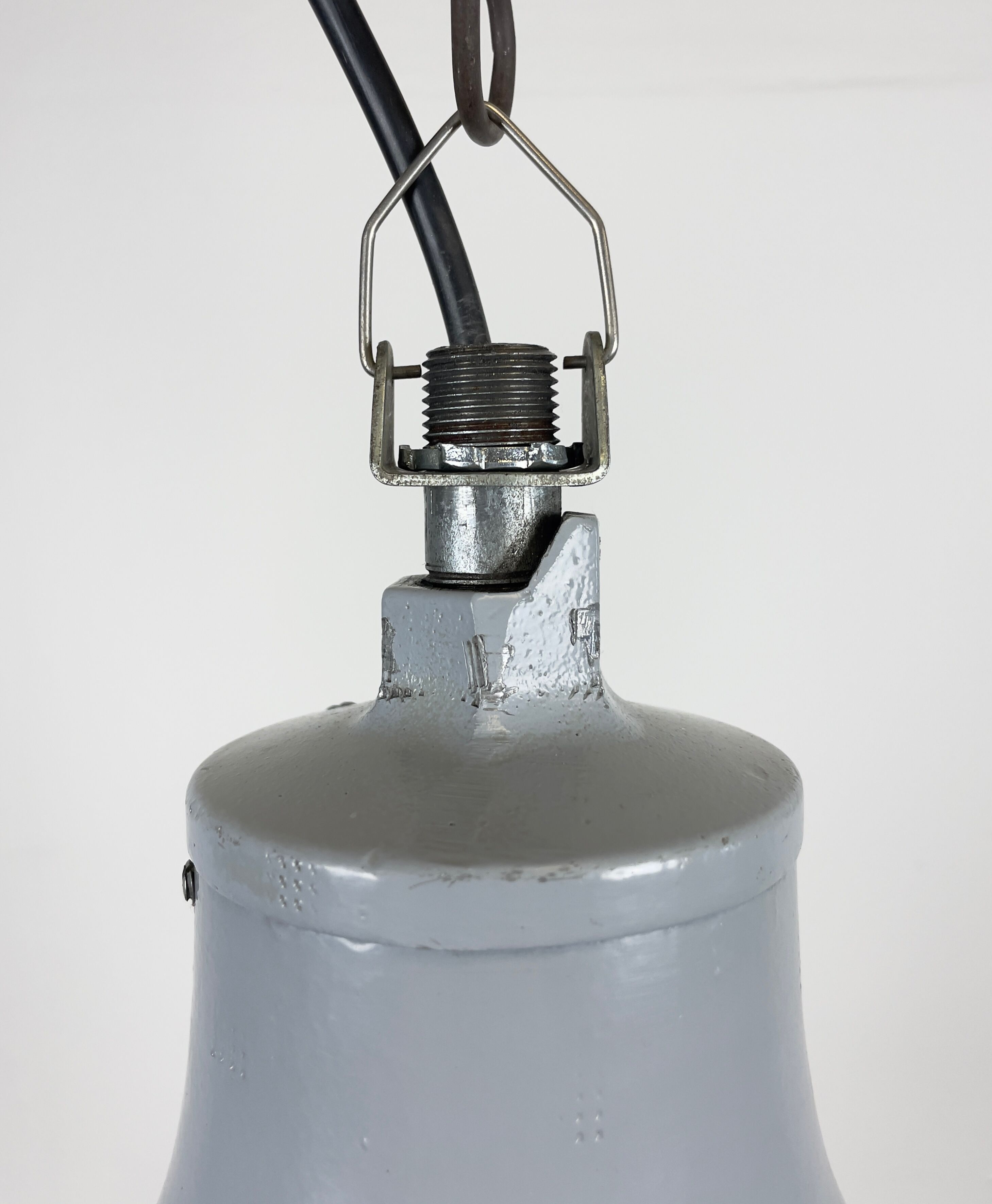 Grey industrial explosion proof light from Crouse-Hinds, 1970s