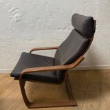 Leather armchair with footrest