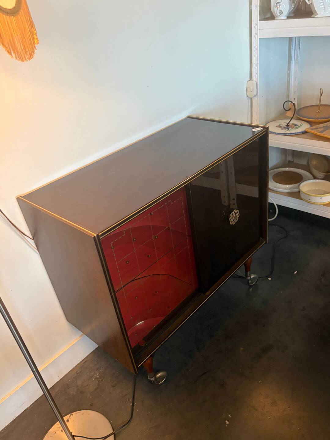 Large vintage bar cabinet from the 50s/60s – illuminated, sliding doors, on wheels.