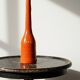 Bright orange mid-century decorative bottle lamp base glazed pottery.