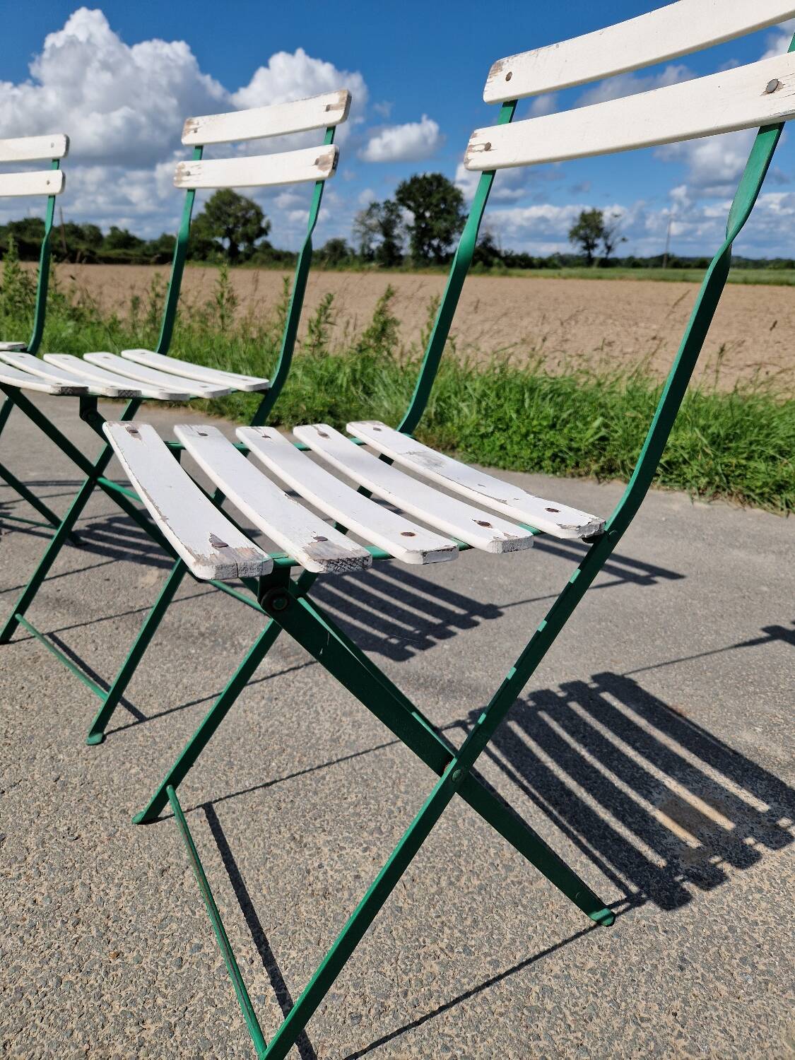 Set of 4 folding wrought iron bistro chairs