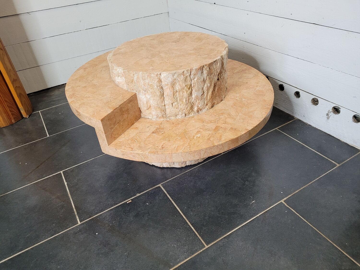 Round stone coffee table by Magnussen Ponte
