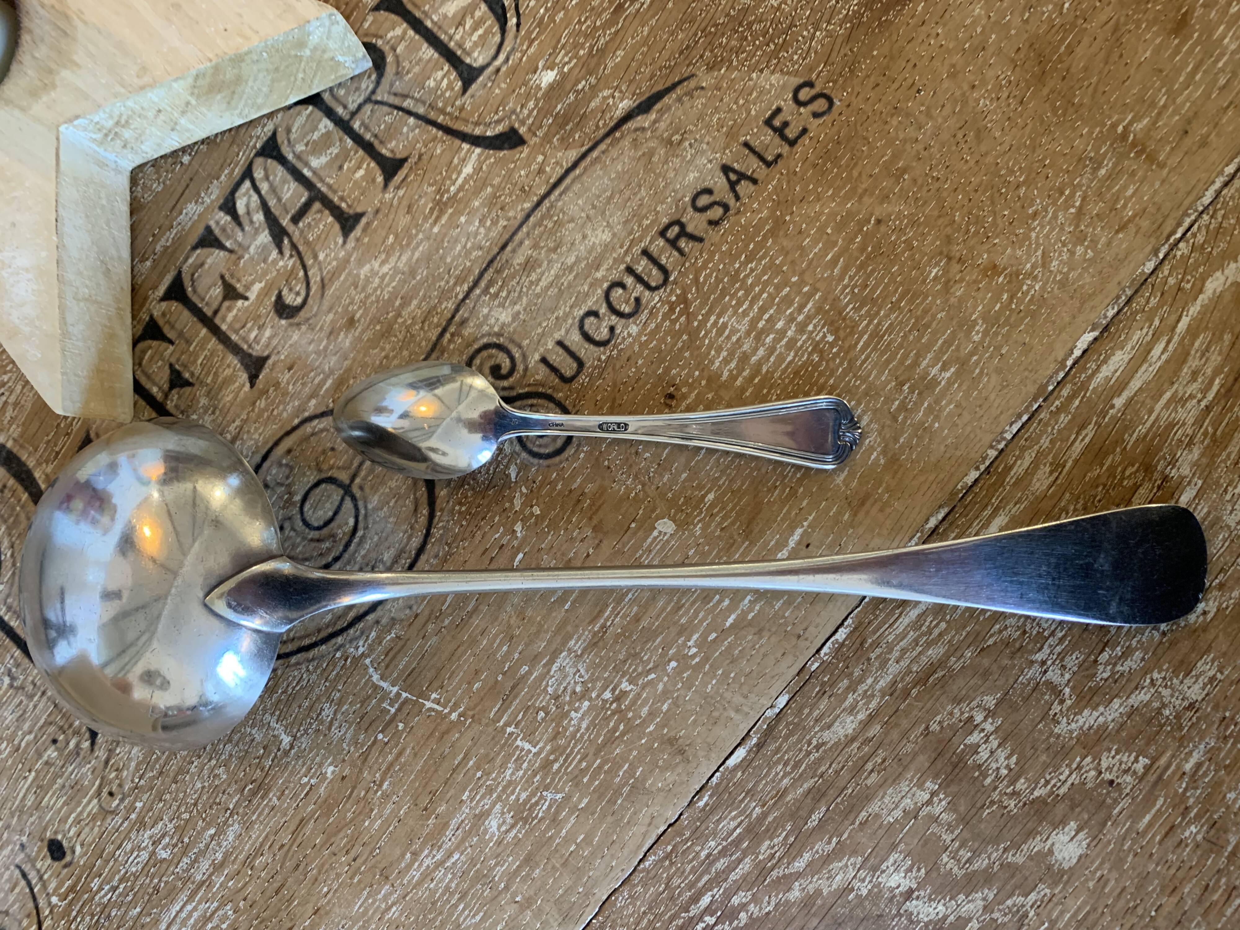 1 ladle and 1 spoon in silver