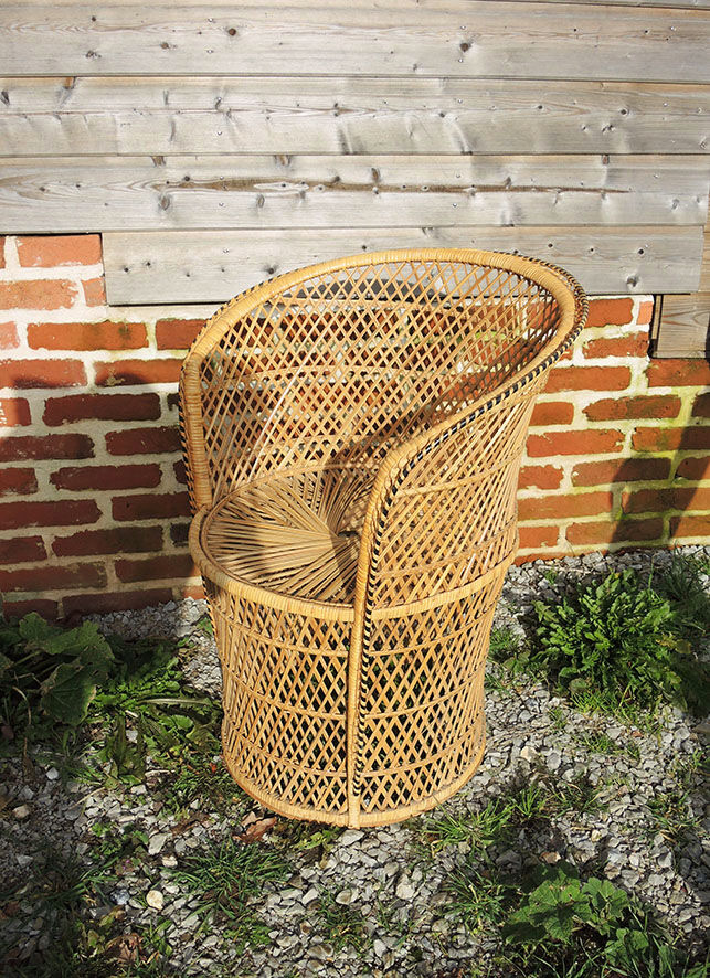 Old wicker / rattan table and armchair