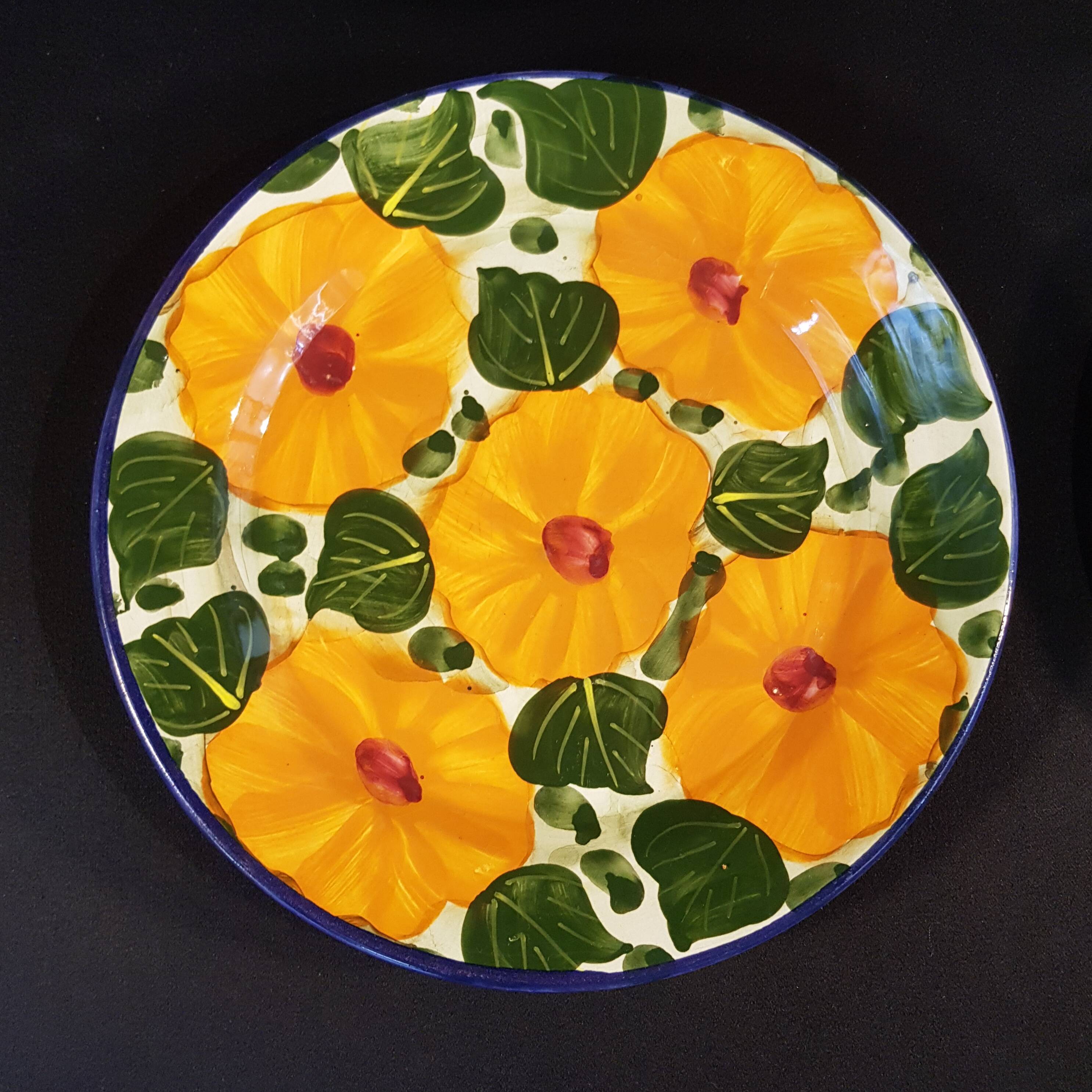 4 decorative earthenware plates