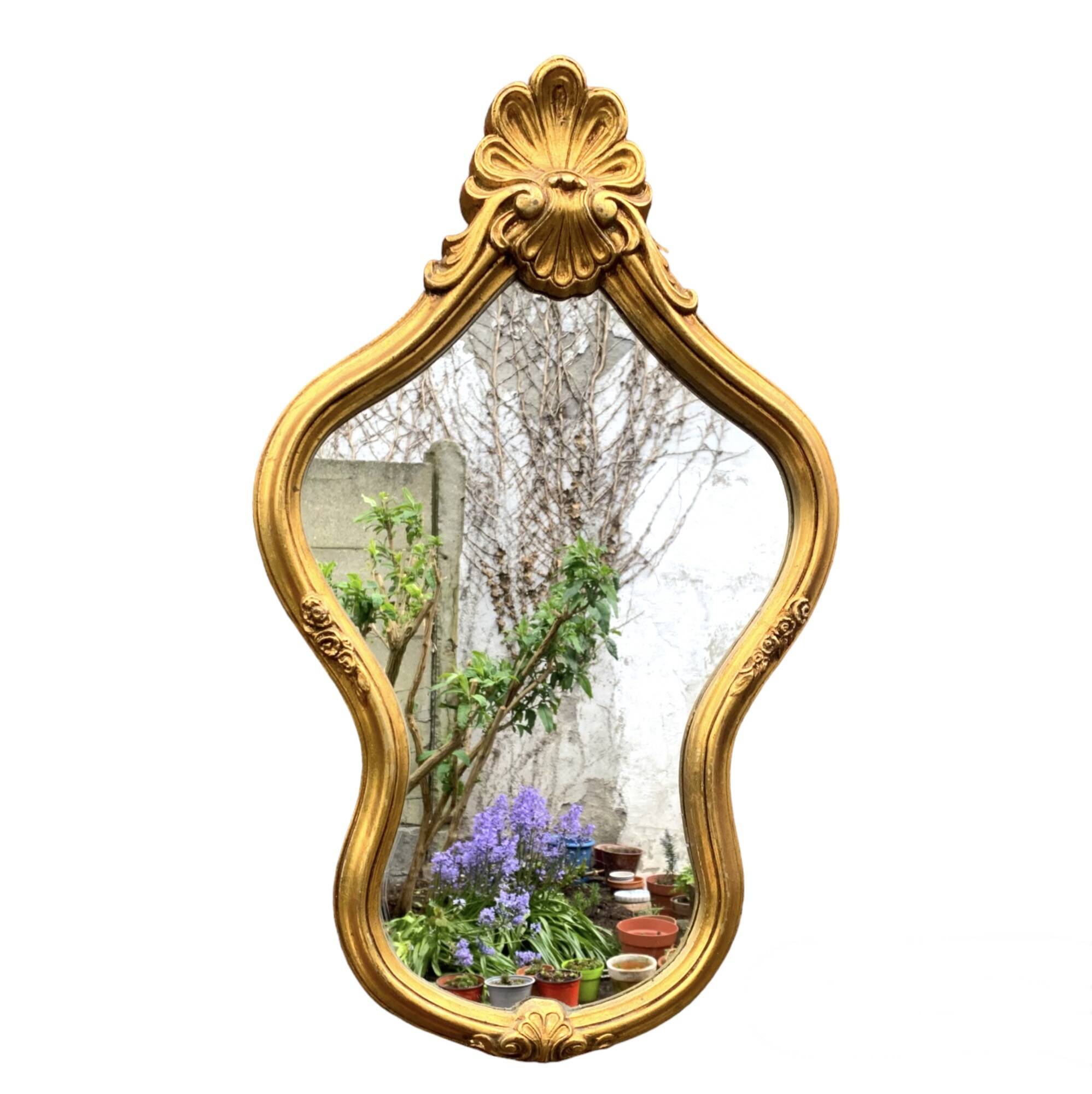 Large rococo mirror in gilded wood