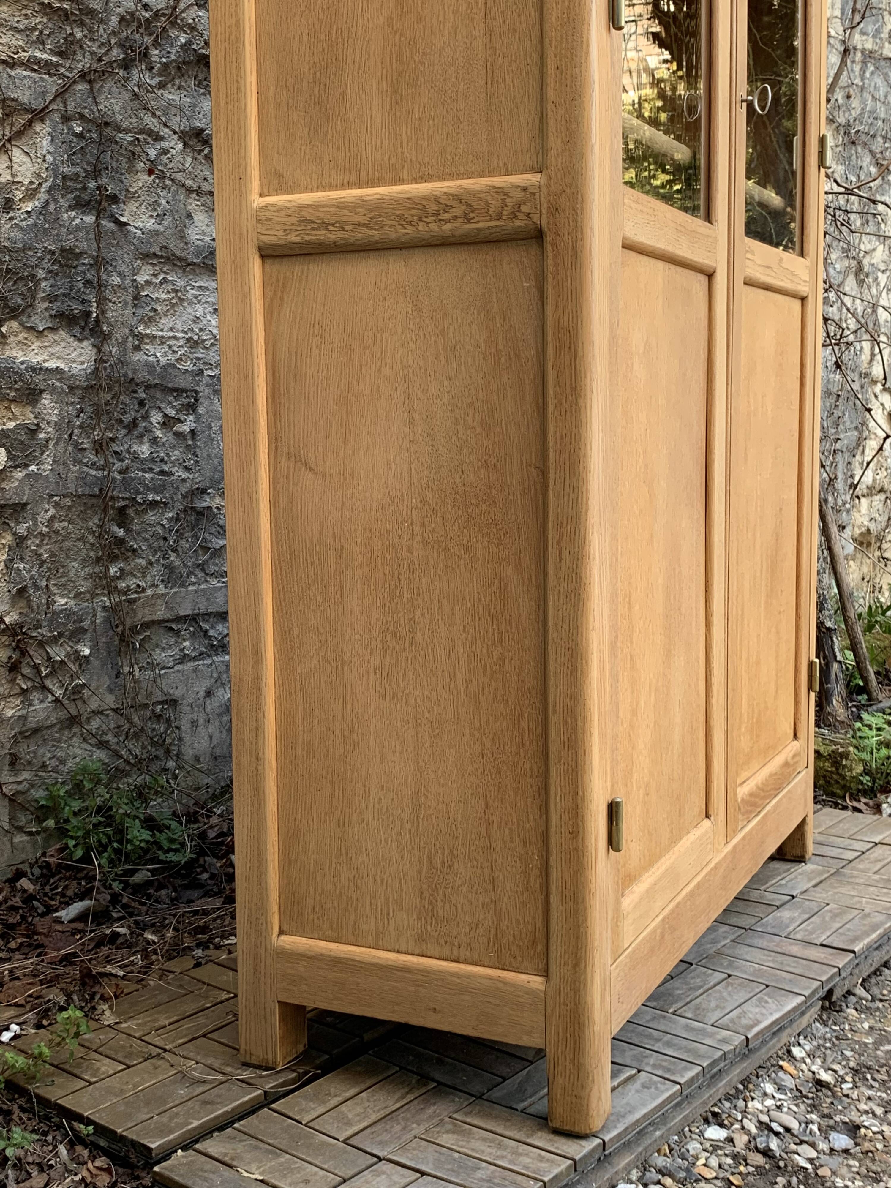 Parisian glass cabinet in solid raw oak, 1950