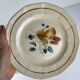 Set of 4 flat plates Sarreguemines flower pattern, first half of the 20th century.