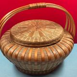Worker vintage wicker covered basket