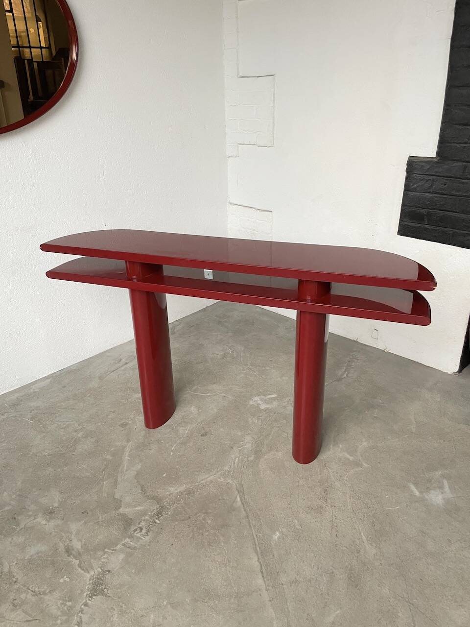 Red lacquered console and its mirror from the 80s