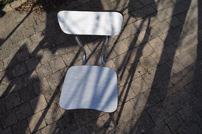 Set of table and four chairs formica