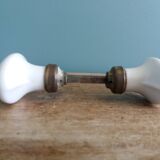 White porcelain door knob handles
