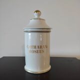 Pharmacy / apothecary pot in white earthenware decorated with gold net, "Catharan: Roseus signed Limoges