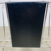 Chrome and black leather magazine rack, 1970s.