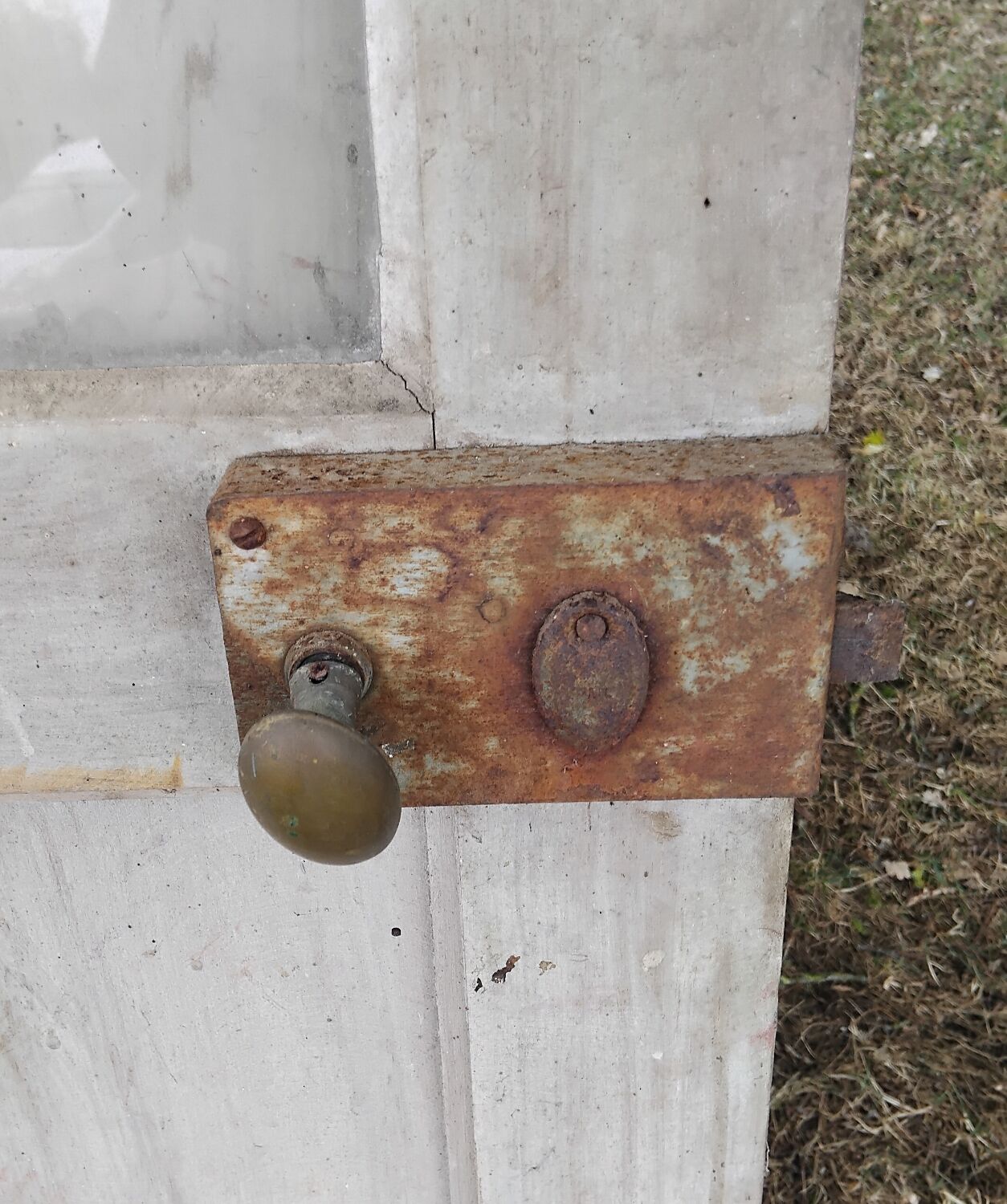 Old door with vintage wooden shutters