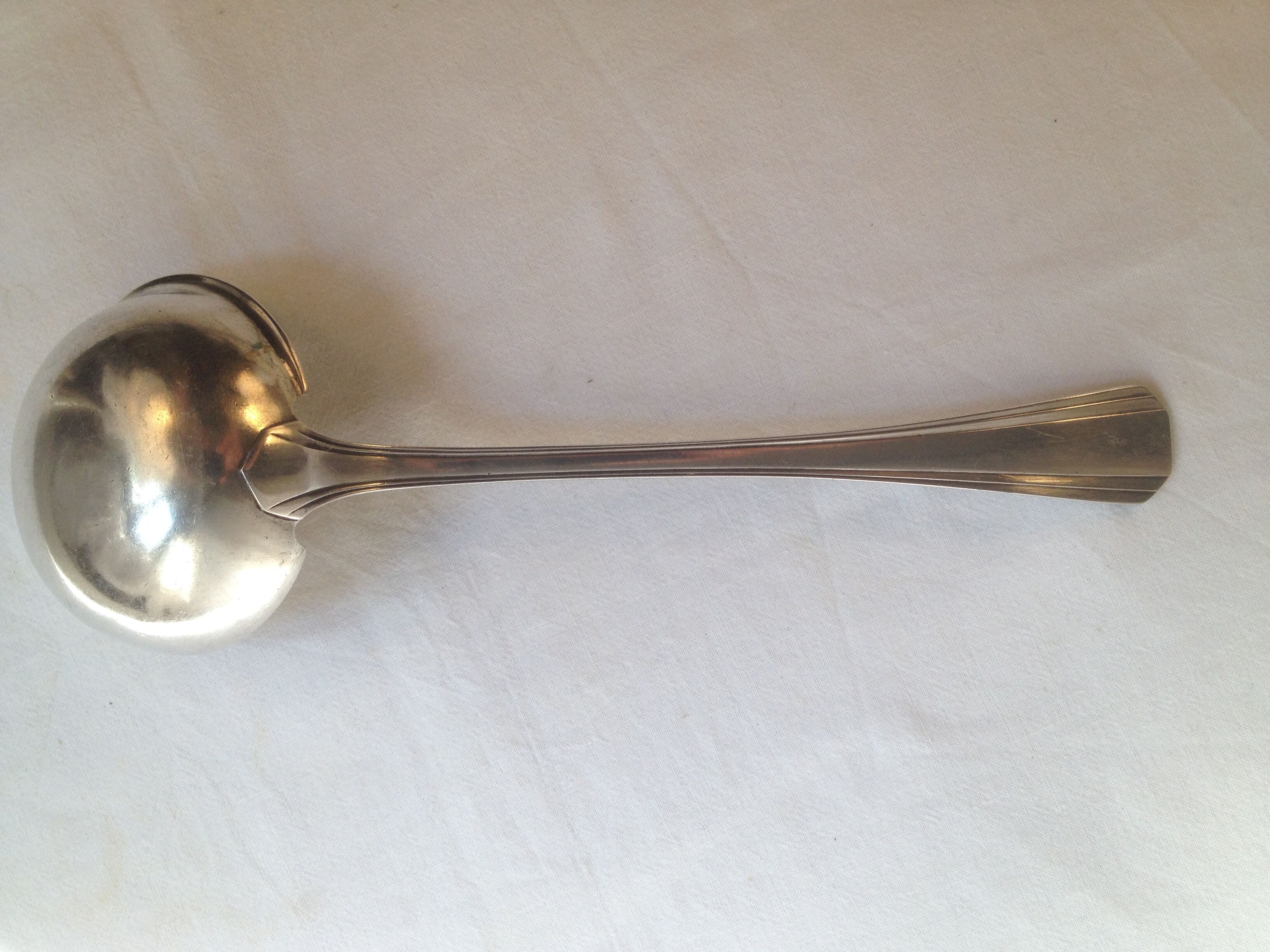 Cream ladle, Christofle, Boreal model in silver metal