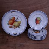 Set of 7 dessert plates and a cake stand with fruit patterns.