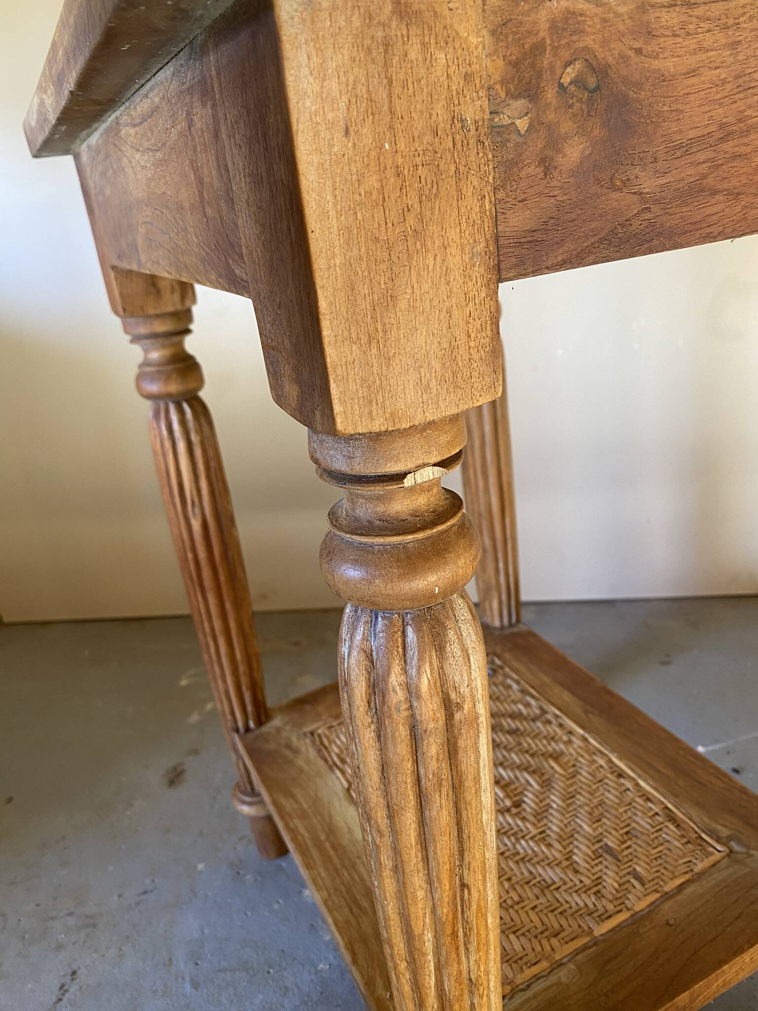 Vintage wooden and wicker side table