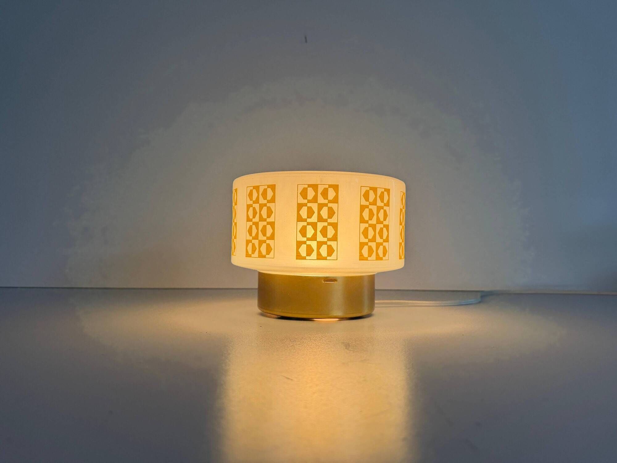 Ceiling light or wall sconce in opal glass with yellow decorations by VEB, 1950s, Germany.