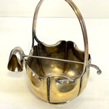 silver metal sugar bowl with gold patina