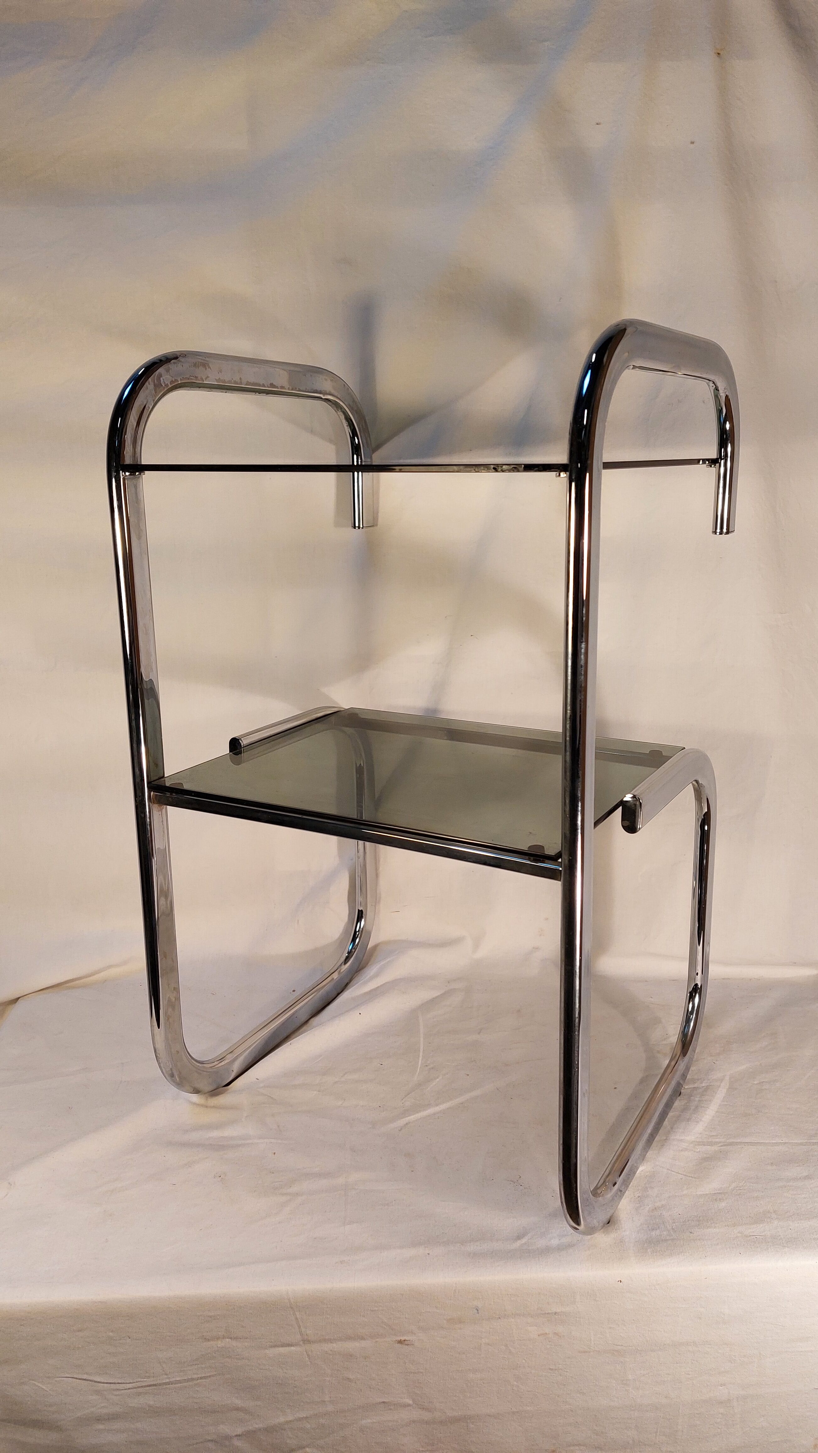 Vintage side table in chrome and smoked glass