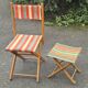 Folding canvas chair with stool, 1950s.