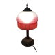 Old table/bedside lamp with glass shade with pink gradients and fringes.