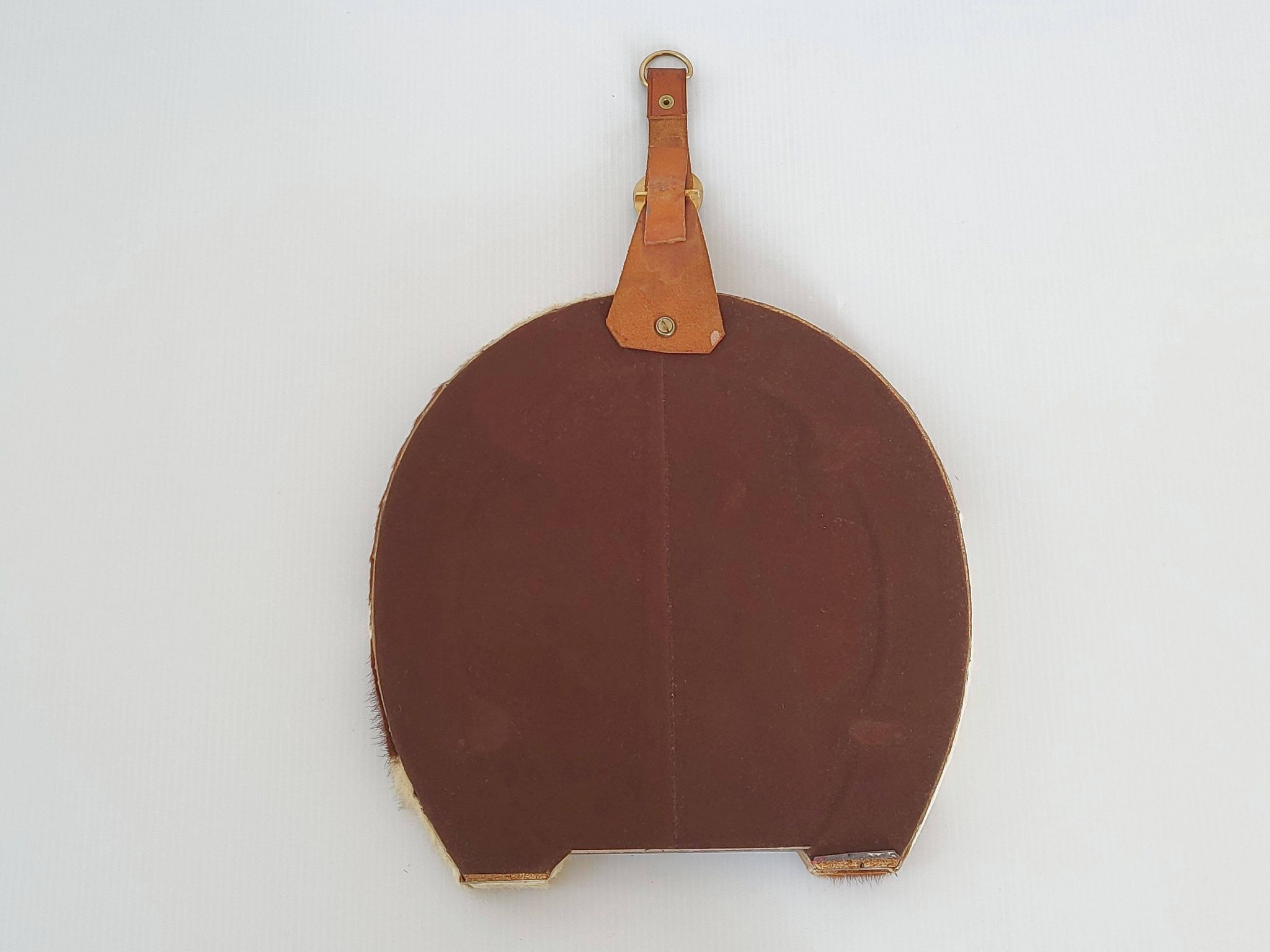Vintage 1970s cowhide horseshoe mirror