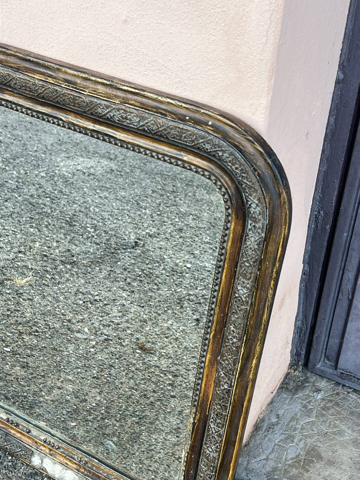 Miroir louis Philipe en bois doré sculpté fronton arrondi